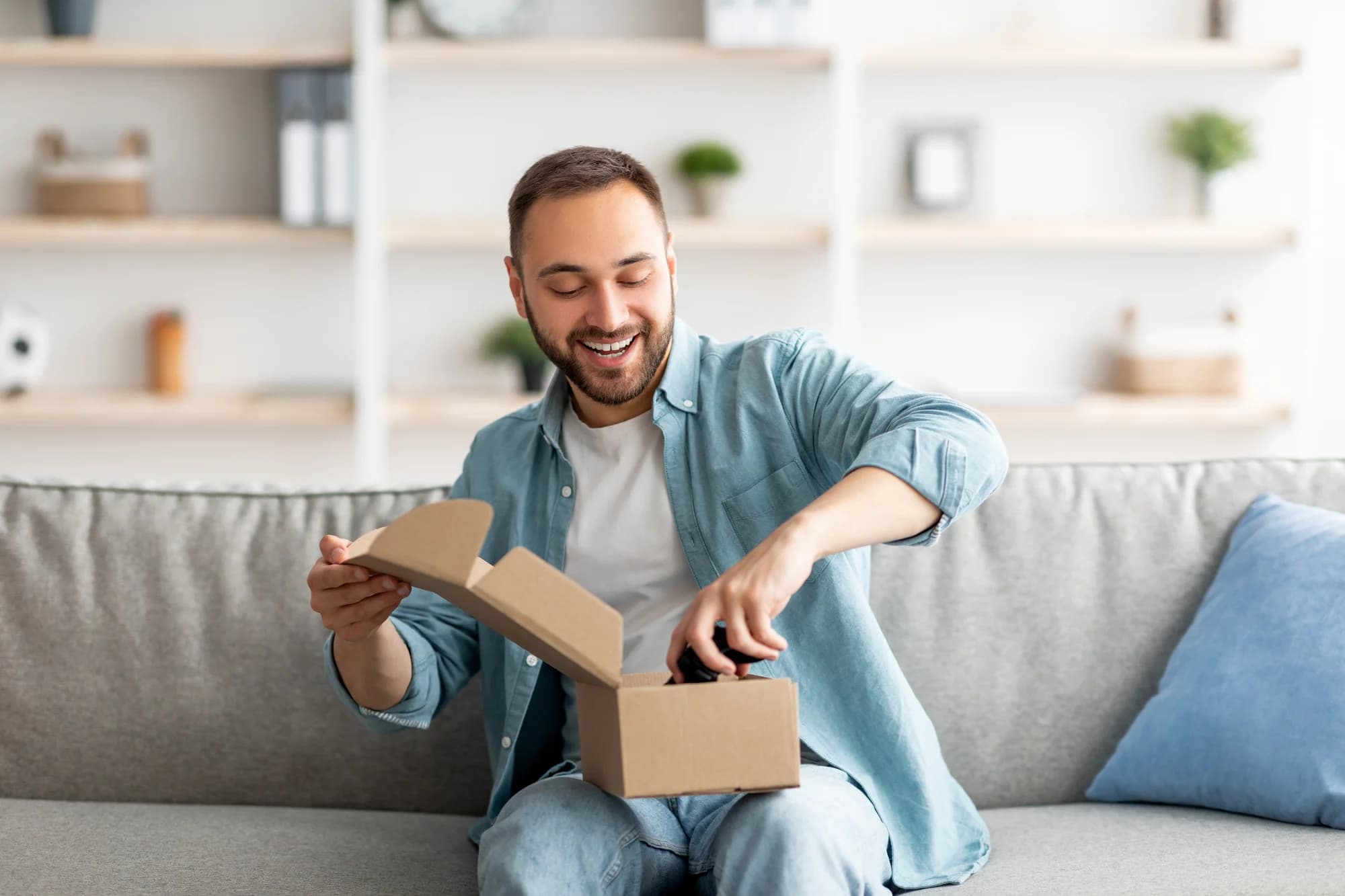 man opening packages